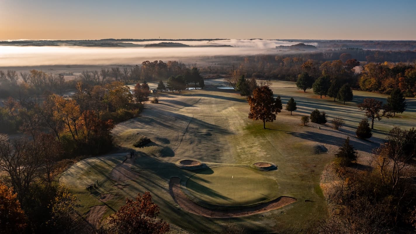 Aerial view of a course at sunrise